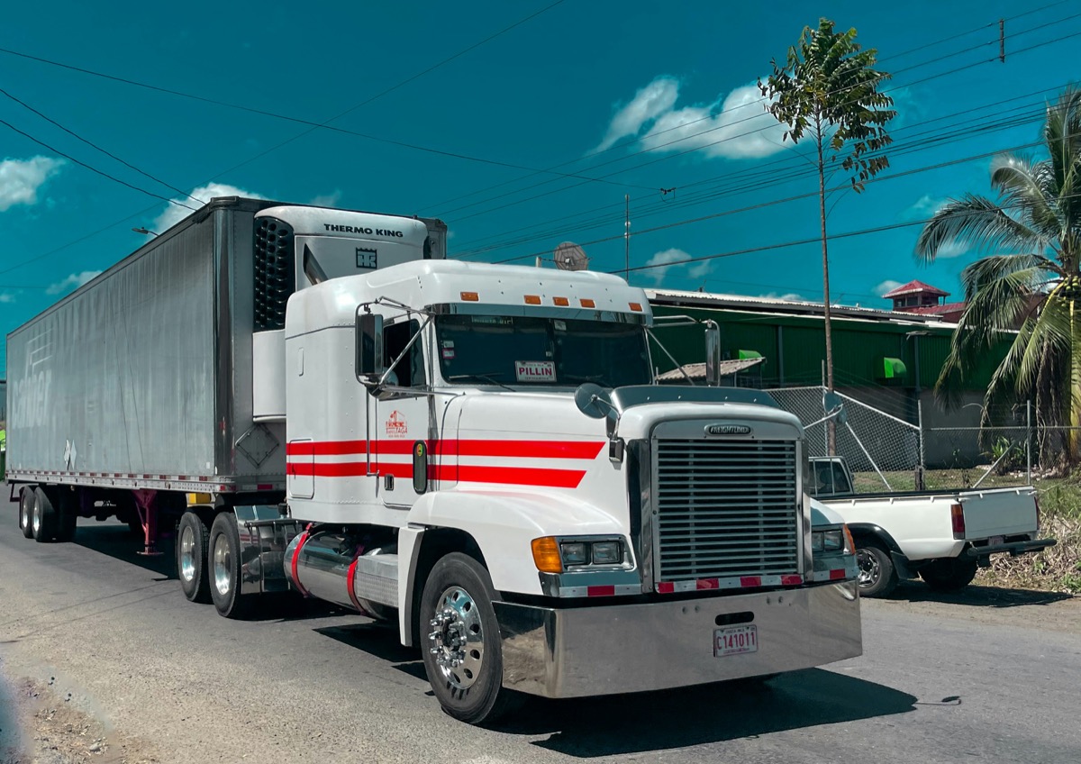 Semi trucks on a highway representing the autonomous trucking industry shift
